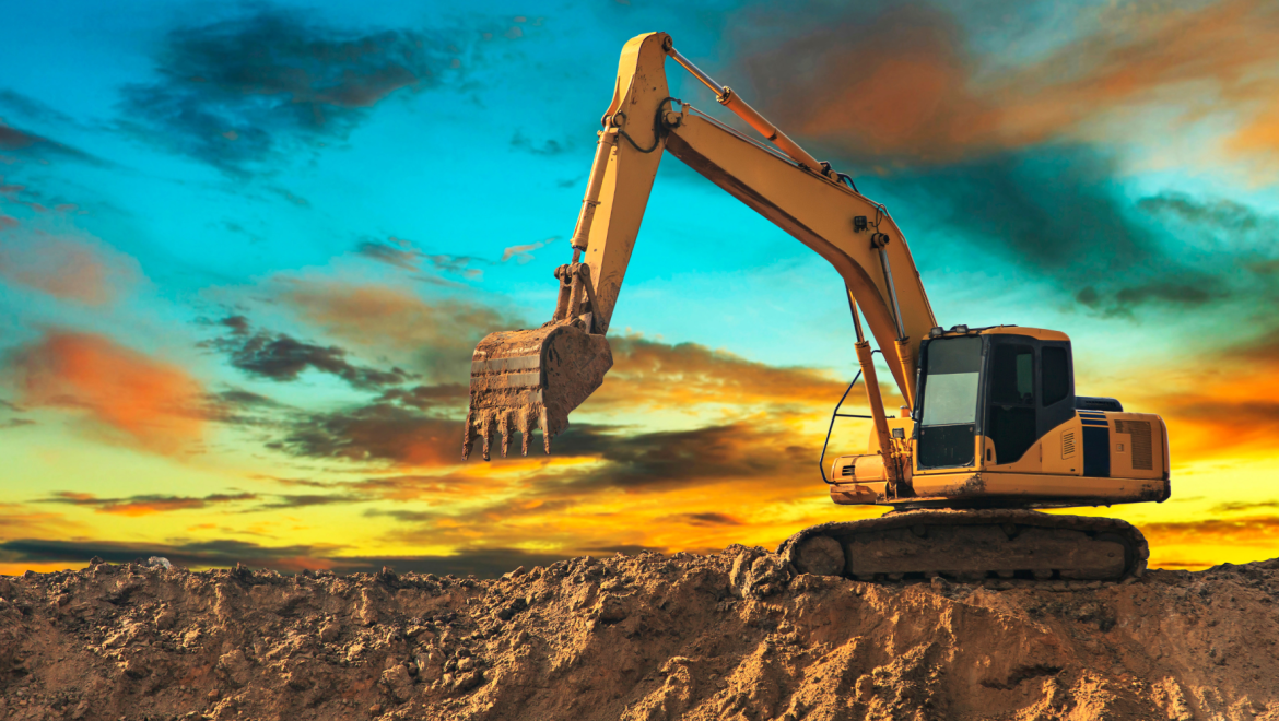 Excavator with a sunrise